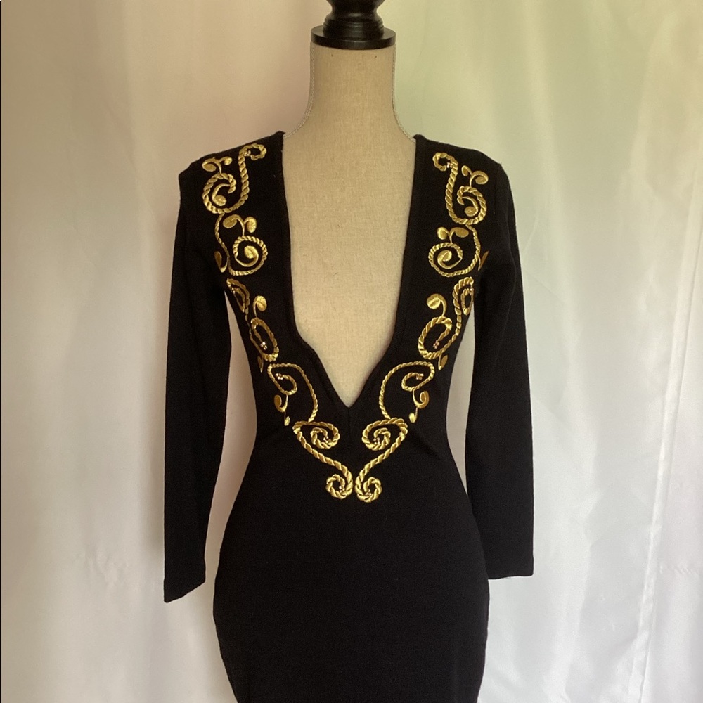 Low cut black and gold dress
